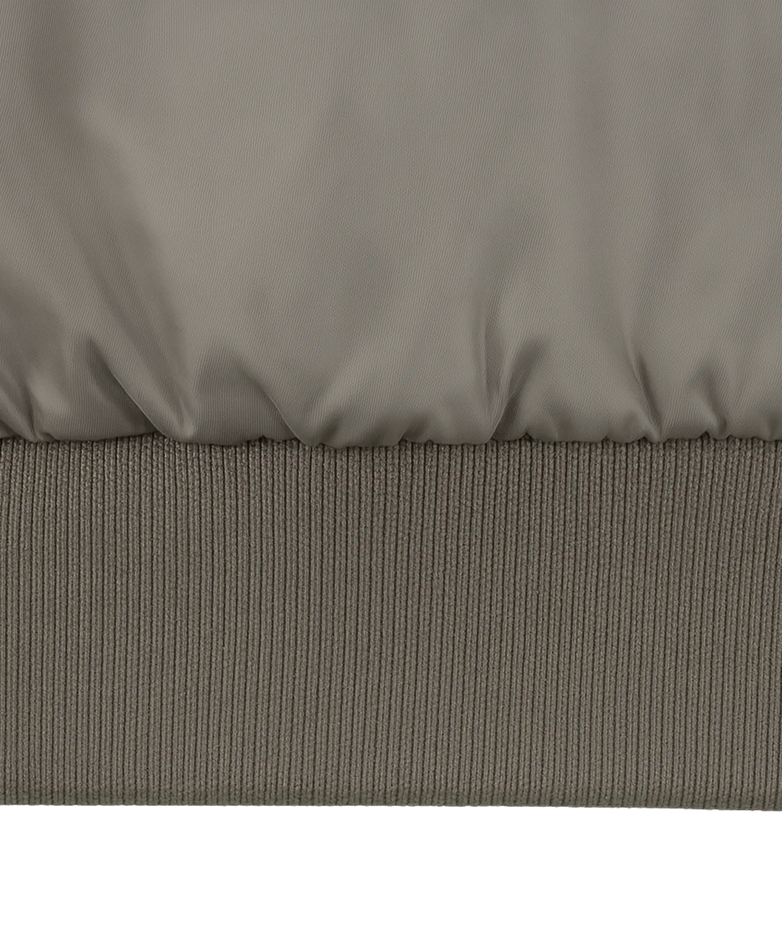 Close-up of a gray quilted fabric surface