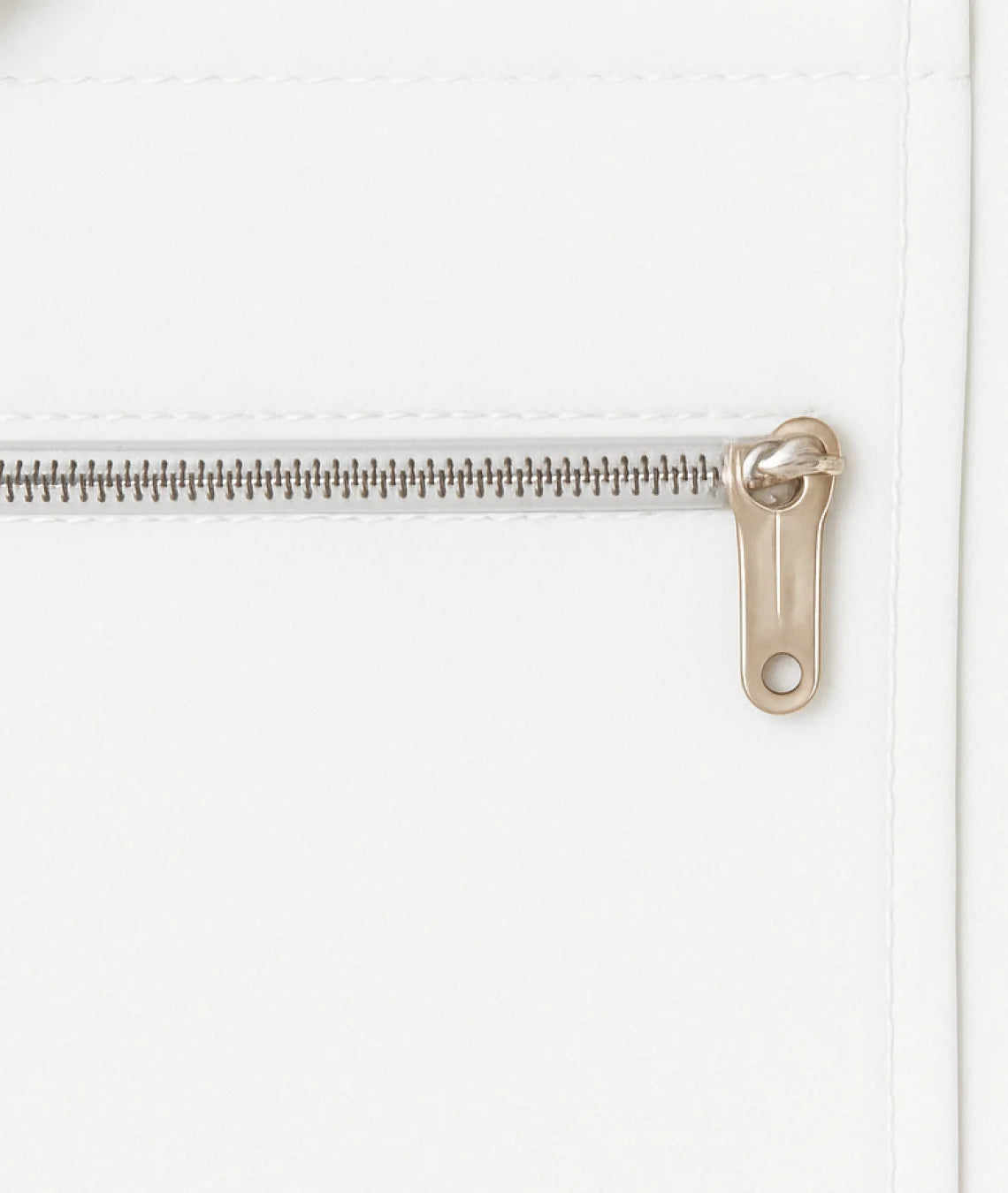 Close-up of a zipper on a white background